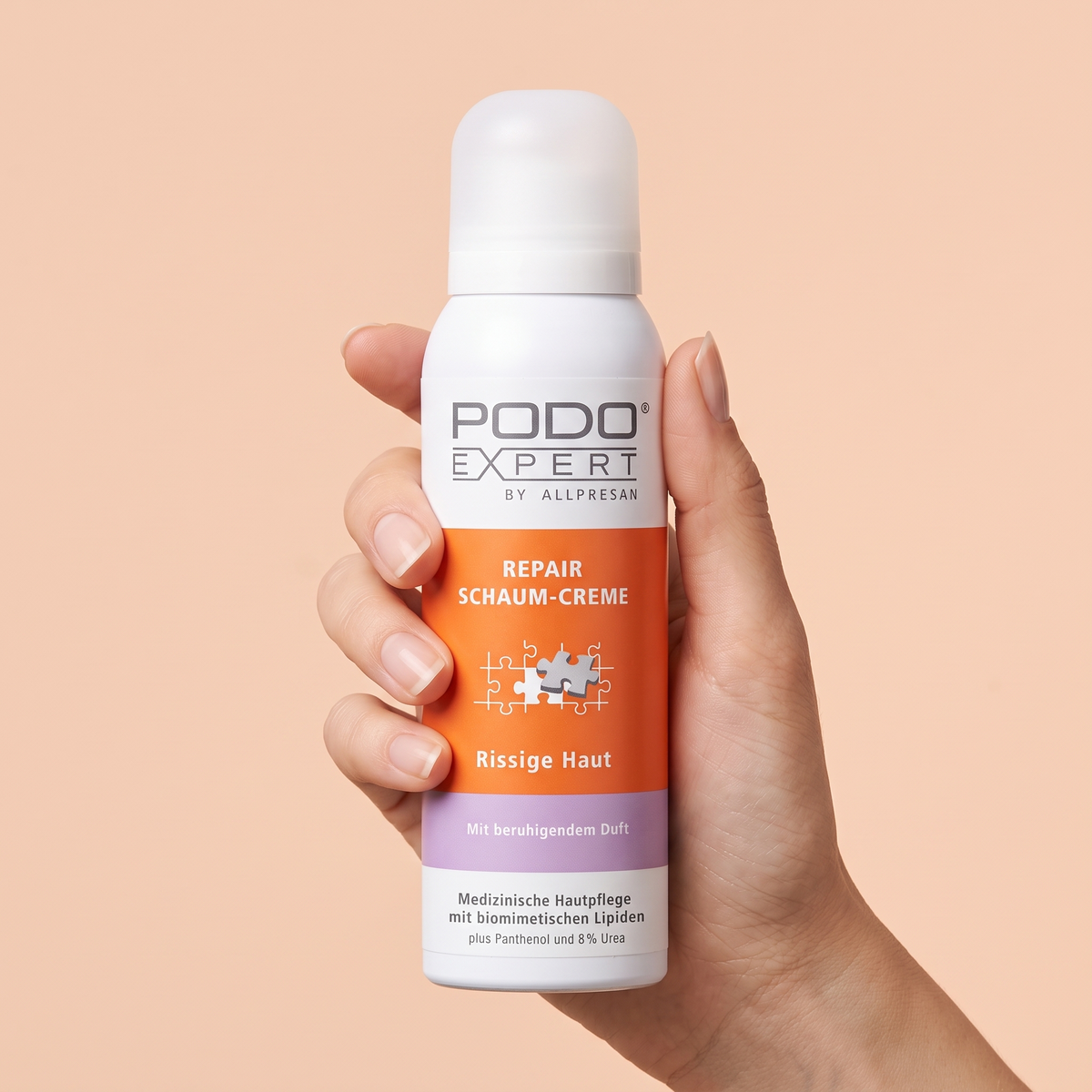 PodoExpert Cracked Skin w/ Smoothing Scent held in hand