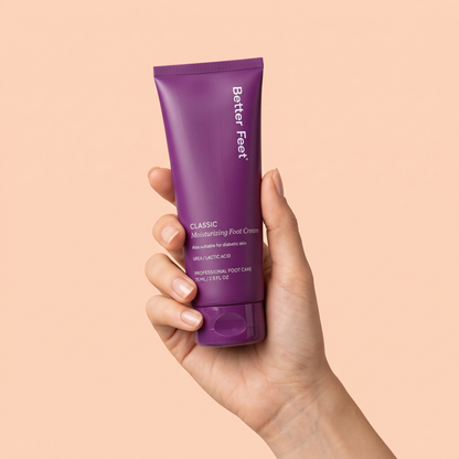 Better Feet® Classic Moisturizing Foot Cream held in hand